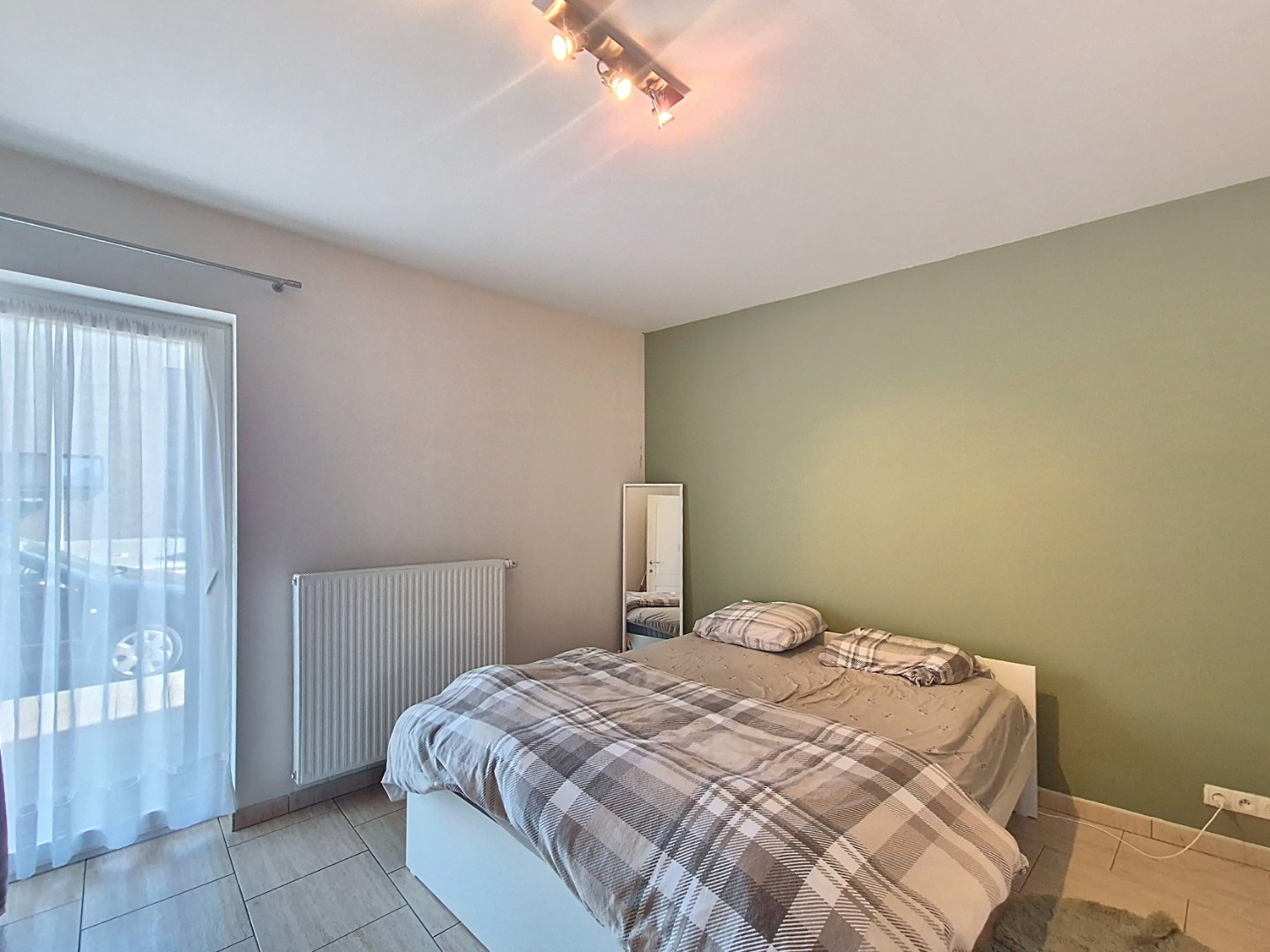 Gelijkvloers appartement met 1 slpk en garage 