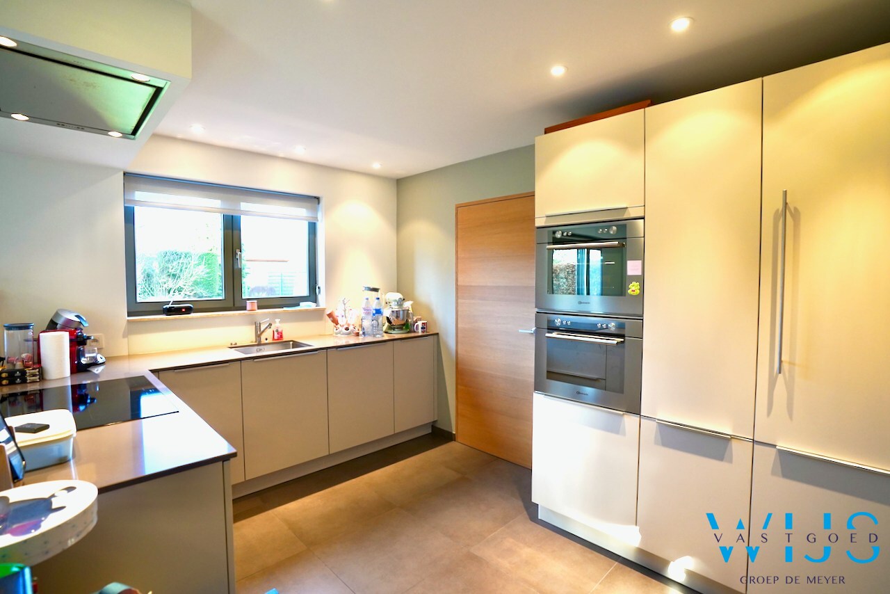 Tof woonhuis in een gekende woonwijk te Evergem 