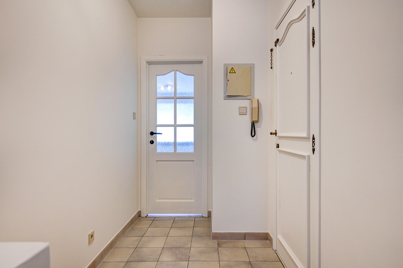Centraal gelegen appartement met ondergrondse garage en groot terras 