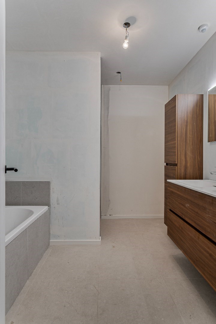 Nieuwbouwappartement met twee slaapkamers, terras en ondergrondse autostaanplaats te koop in Zulte 