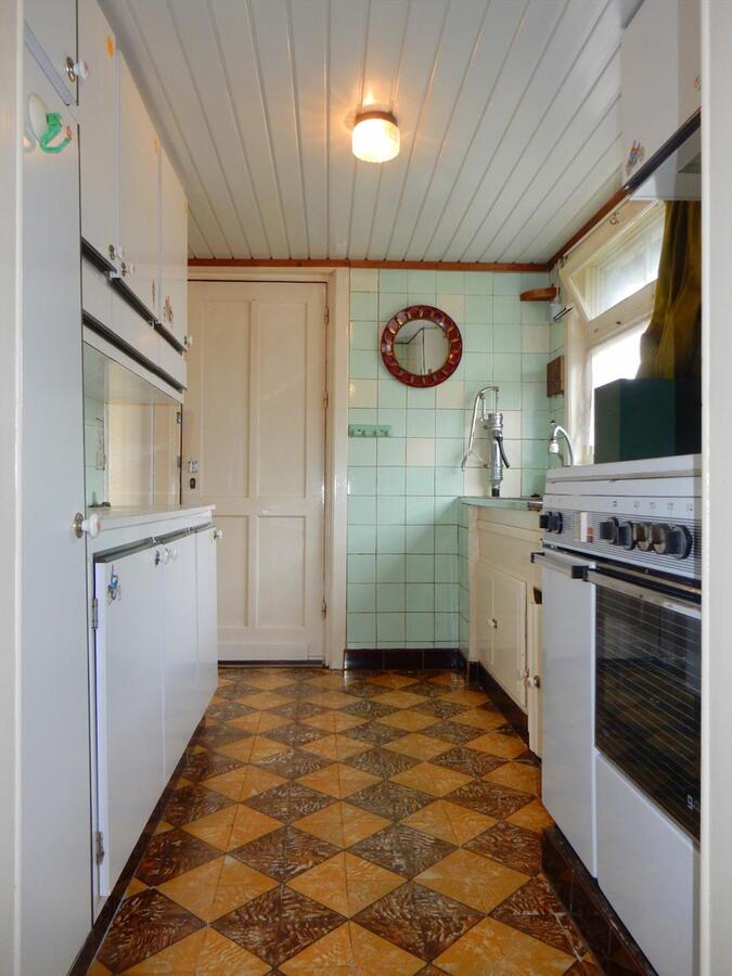 Te renoveren woning op een rustige ligging in de dorpskern 