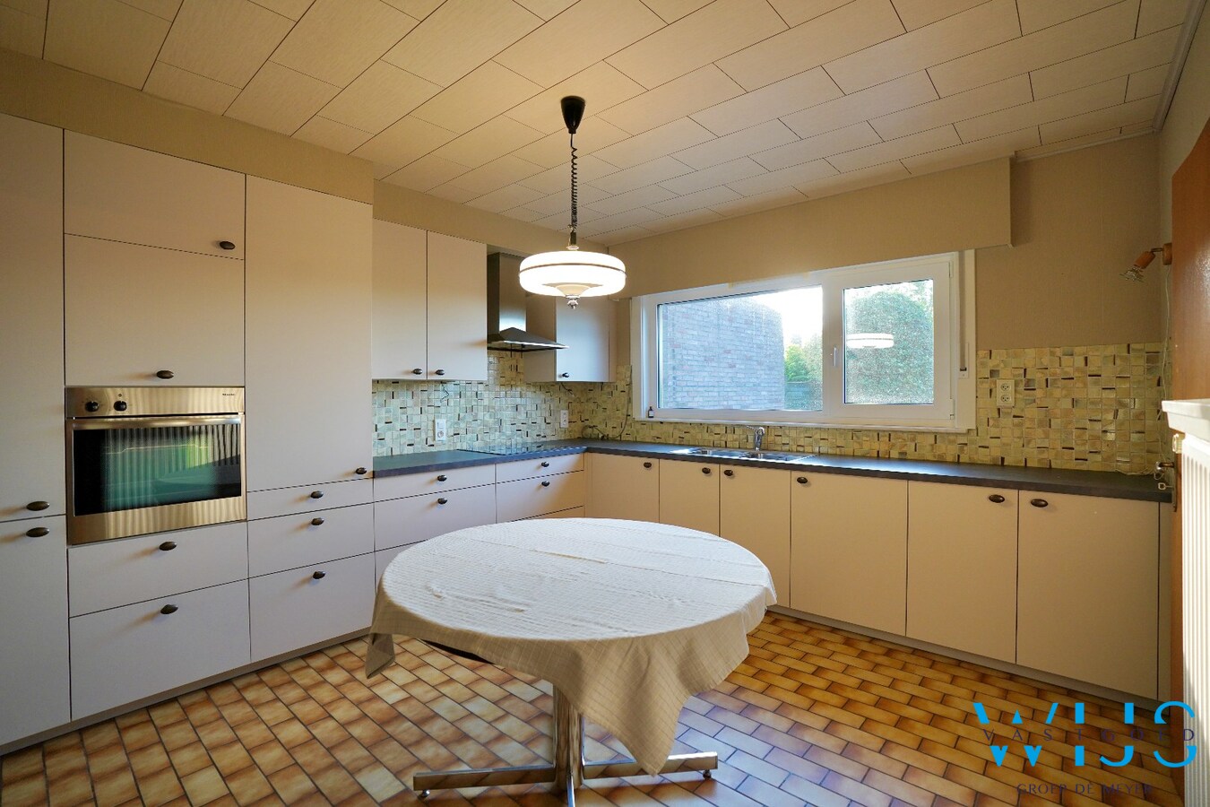 Halfopen bebouwing op mooi perceel van 951 m² te Oosteeklo 