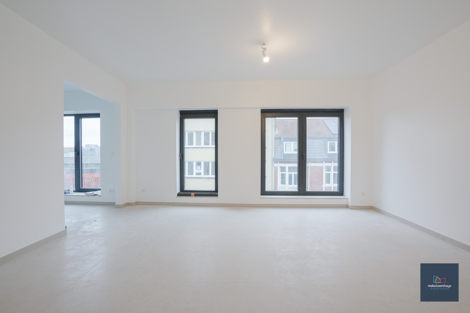 Nieuw gelijkvloers 2 slaapkamerappartement met koer 