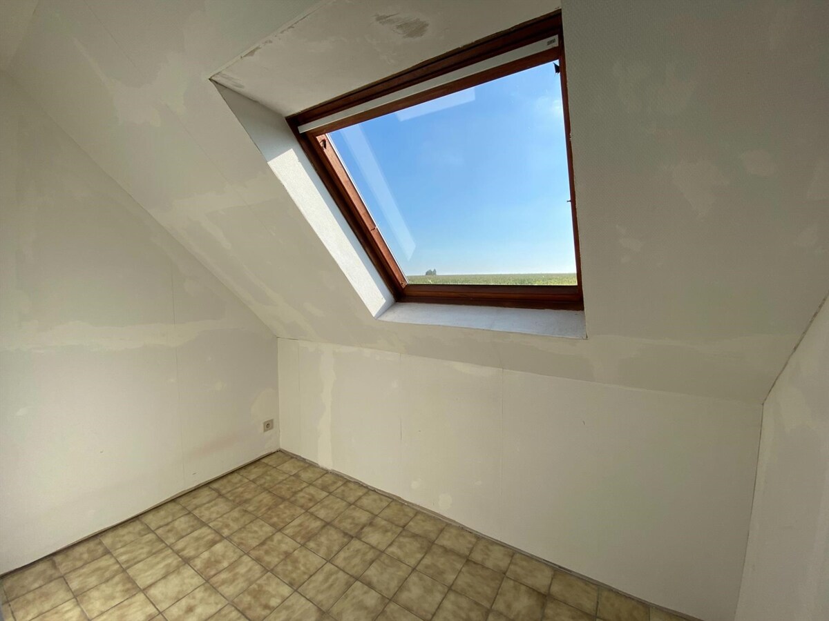 Rustig gelegen woning met garage en zonnige tuin te Poperinge 