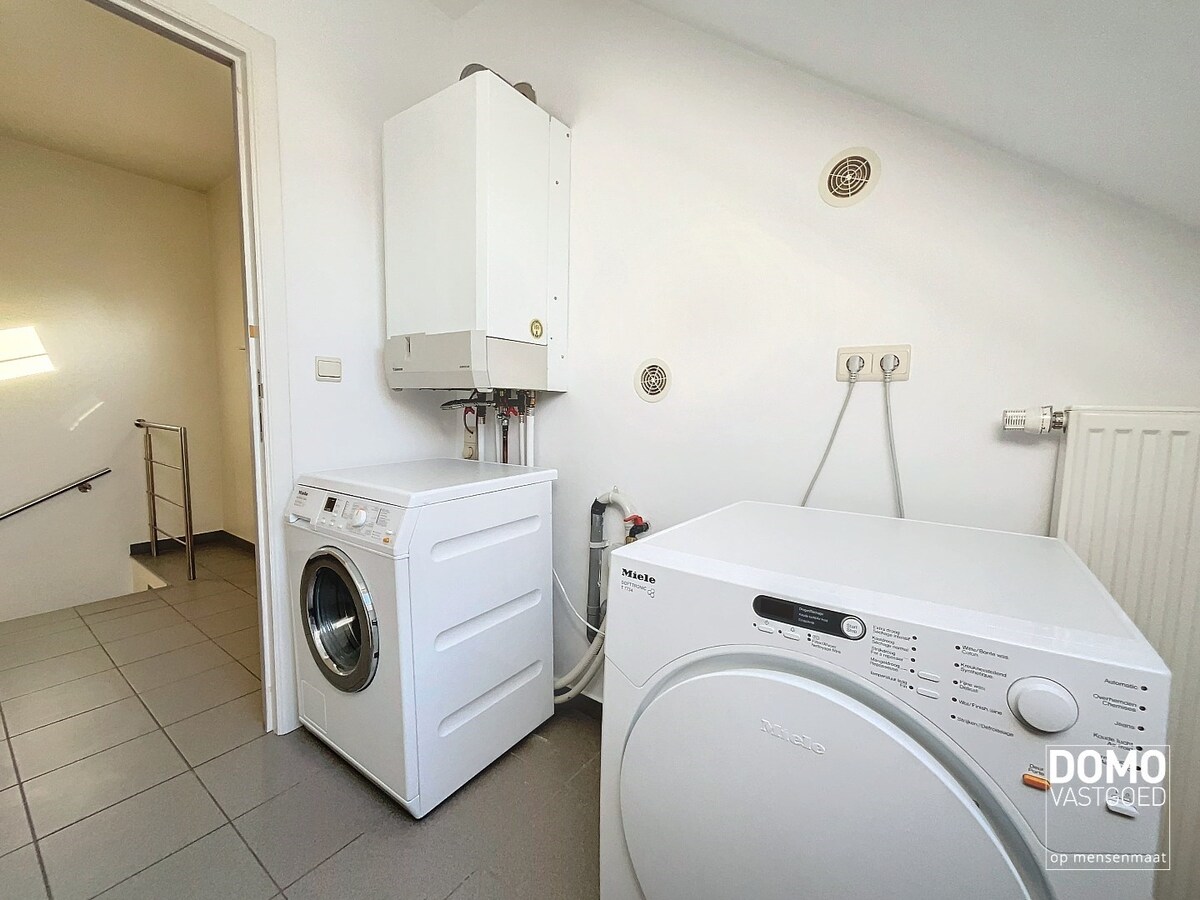 RUIM APPARTEMENT MET 3 SLAAPKAMERS EN GARAGE TE TUILT 