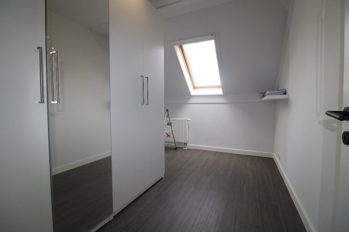 Centraal gelegen appartement met terras, kelderberging en staanplaats 