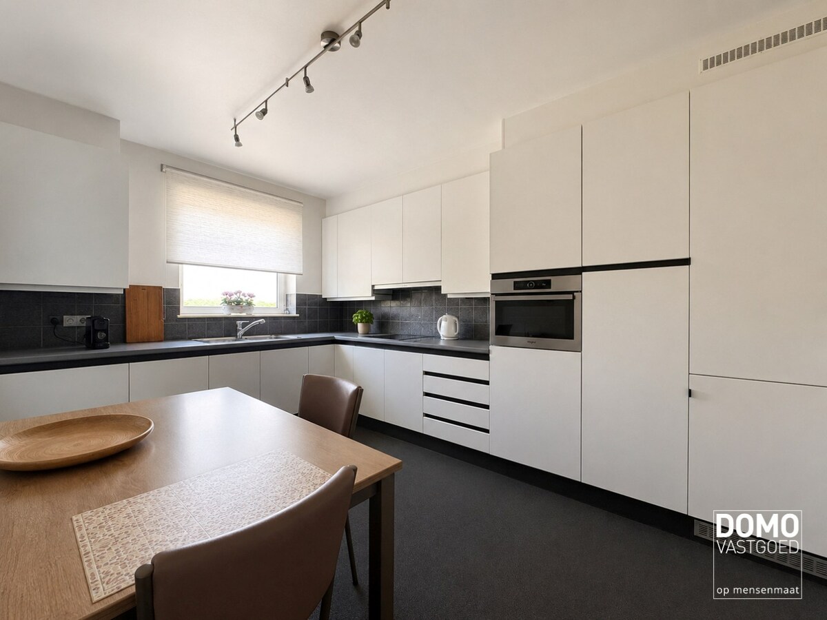 Ruim appartement van 121 m² met drie slaapkamers, twee terrassen en privatieve garagebox op toplocatie in Hasselt 