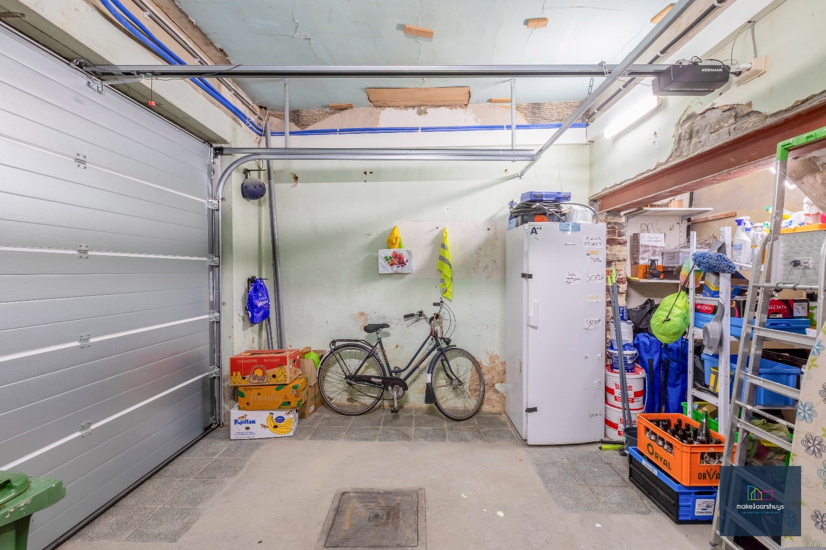 Instapklare woning met aangename tuin en garage 