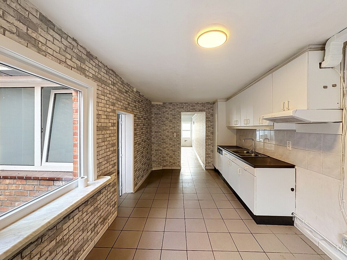 Praktische woning met 3 slaapkamers en tuin in centrum Zomergem 