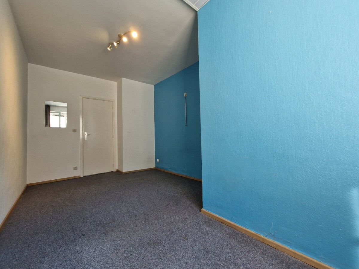 Charmant gelijkvloers appartement met stadskoer in hartje Heist 