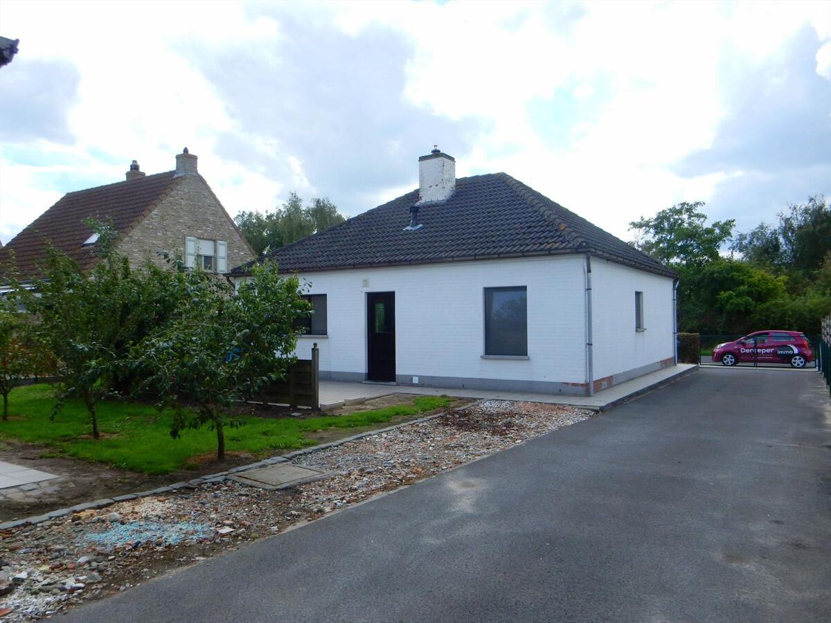 Alleenstaande woning met loods 