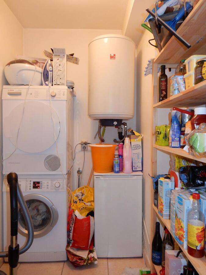 Gezellig gelijkvloersappartement met zonnige tuin en garage 