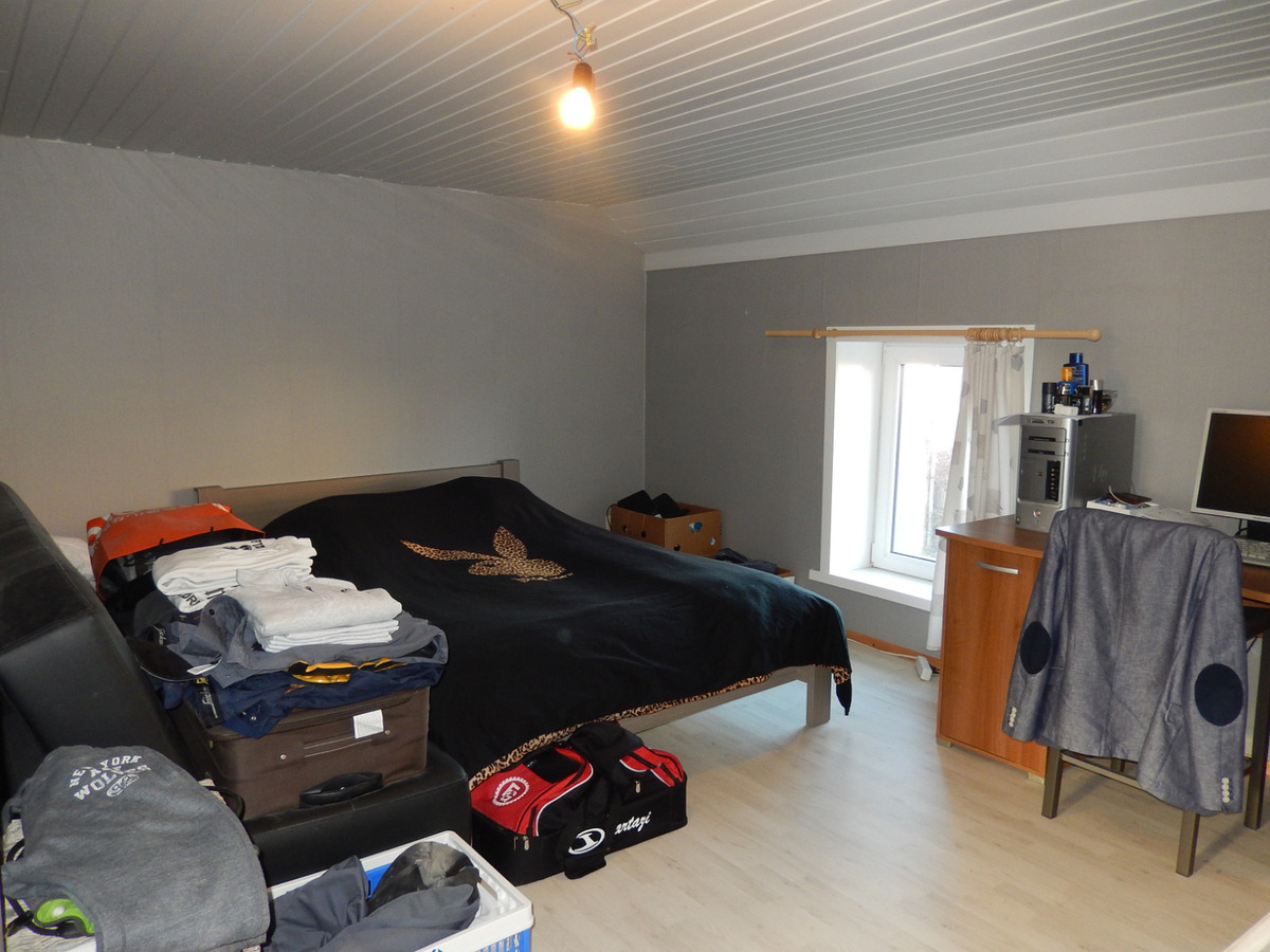 Gezellige instapklare rijwoning met koer 