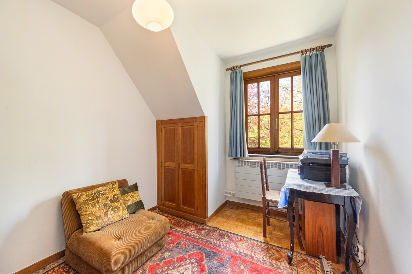 Villa met praktijkruimte en dubbele garage op riant perceel van 2.010 m² te Schoten 