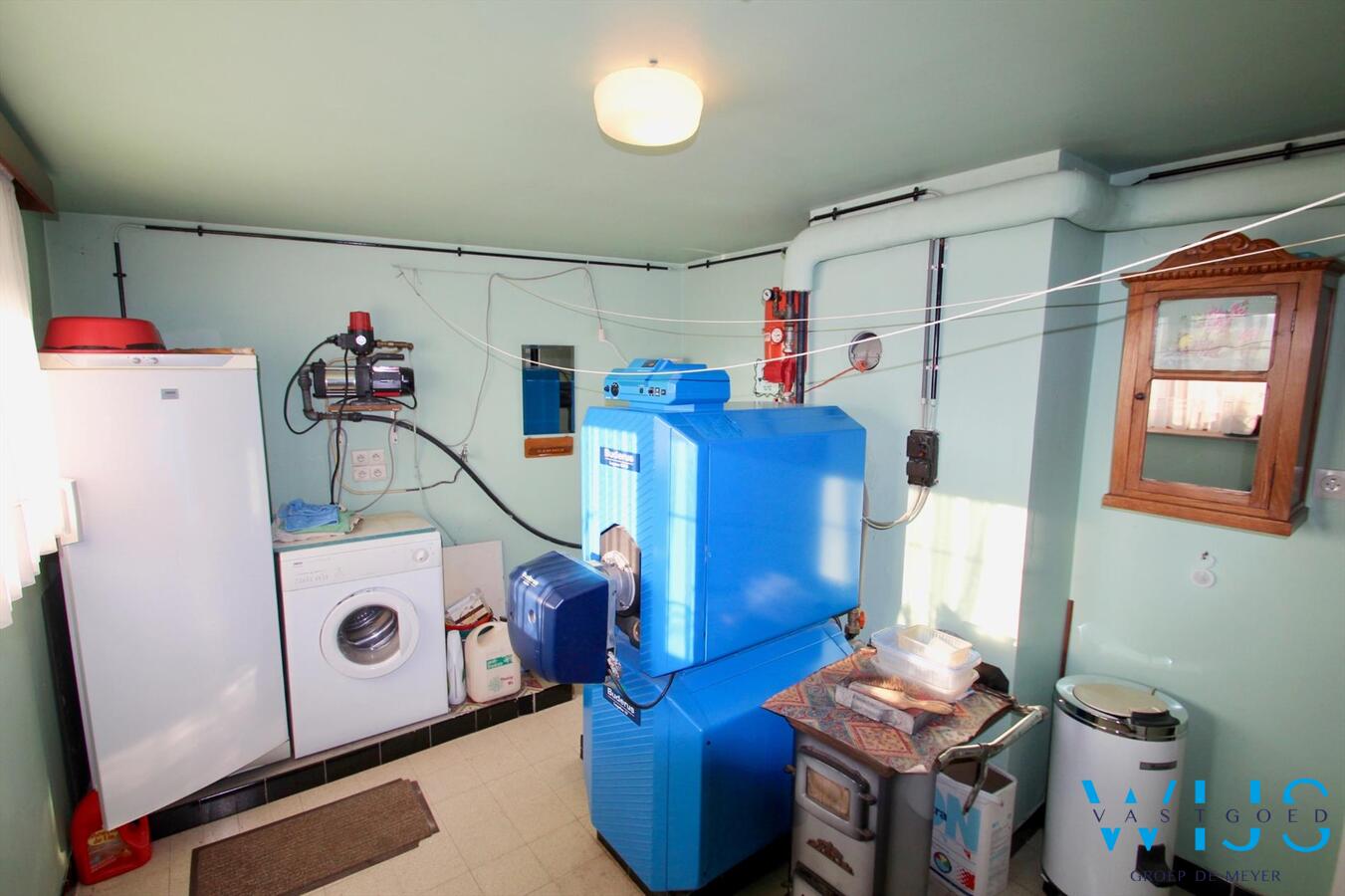 Zeer degelijk woonhuis op een ruim rustig perceel te Bassevelde ! 