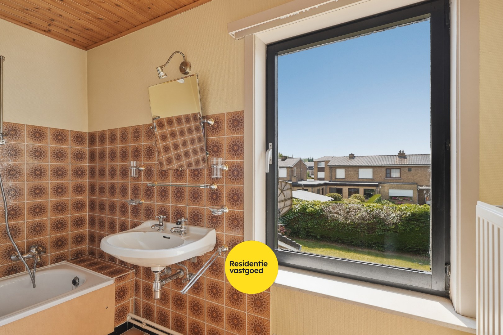 Renovatiewoning met 3 slpks, garage en zonnige tuin 