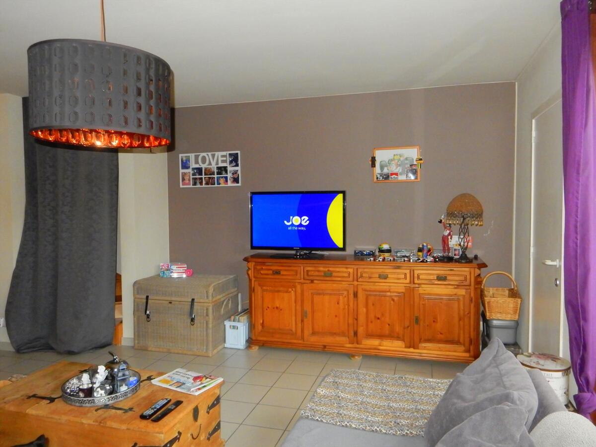 Gezellige rijwoning met tuin en een dubbele garage 