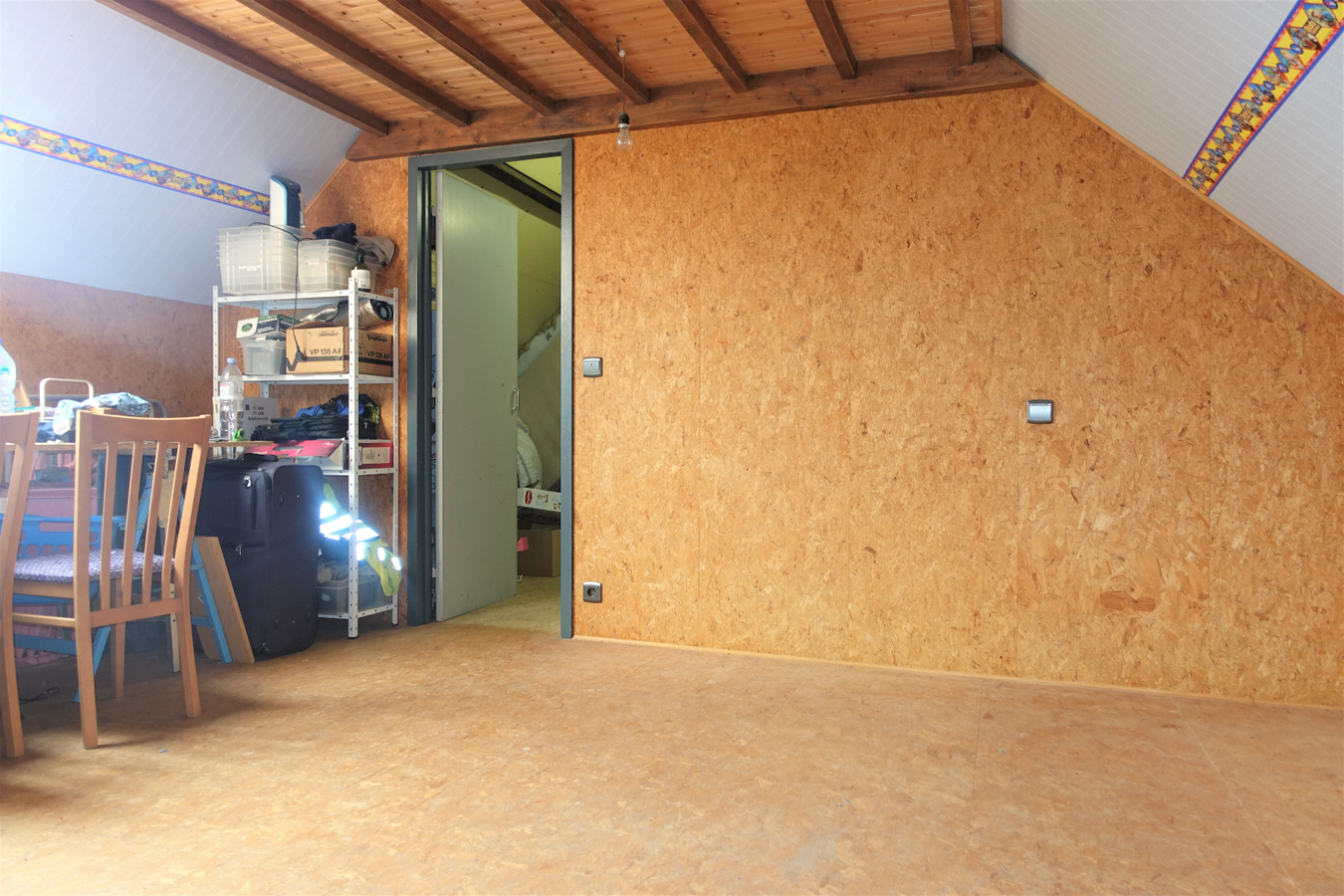 Half-open woning met grote tuin te Aartrijke 