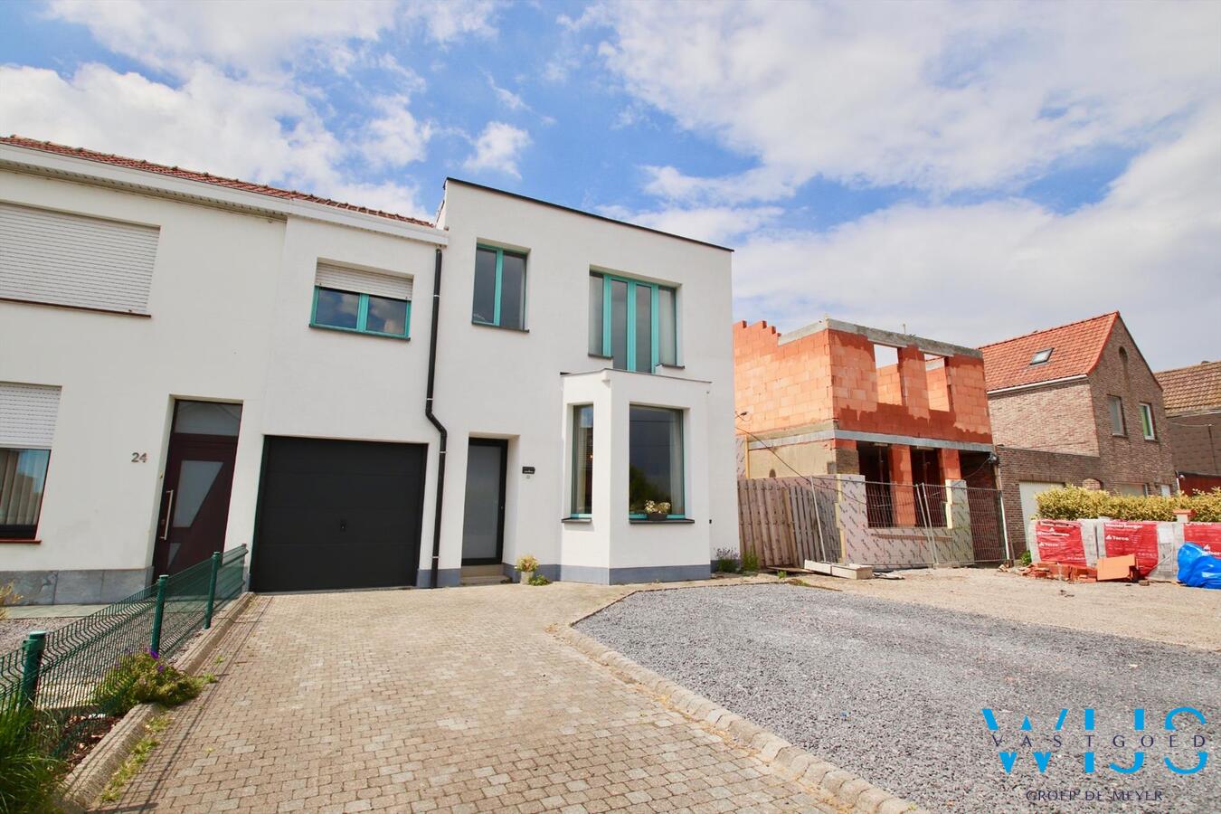 Leuke gezinswoning met 4 slaapkamers + tuin en garage te Zelzate! 