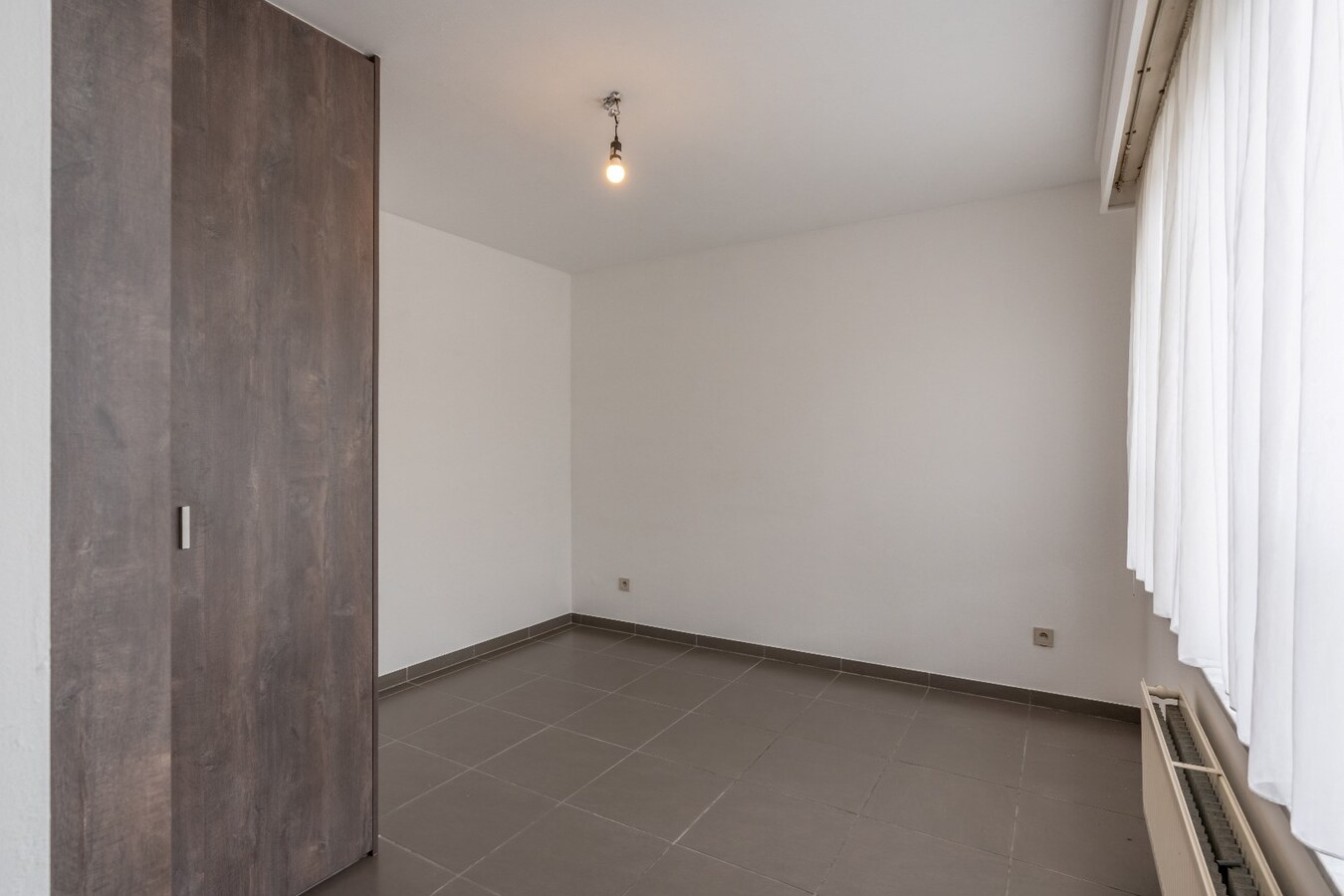 Gelijkvloersappartement met 1 slaapkamer en garage 