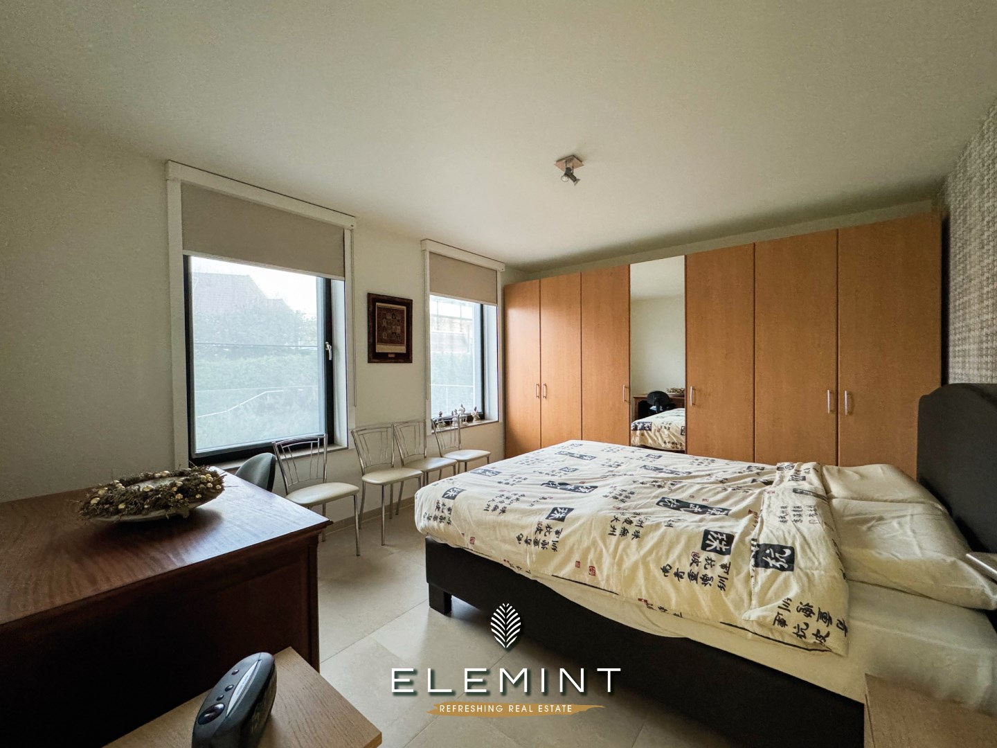 Ruim modern appartement met terras, 2 slaapkamers en 2 staanplaatsen 