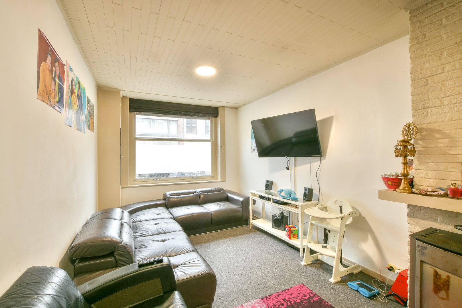 Centraal gelegen rijwoning met 4 slaapkamers en koer 