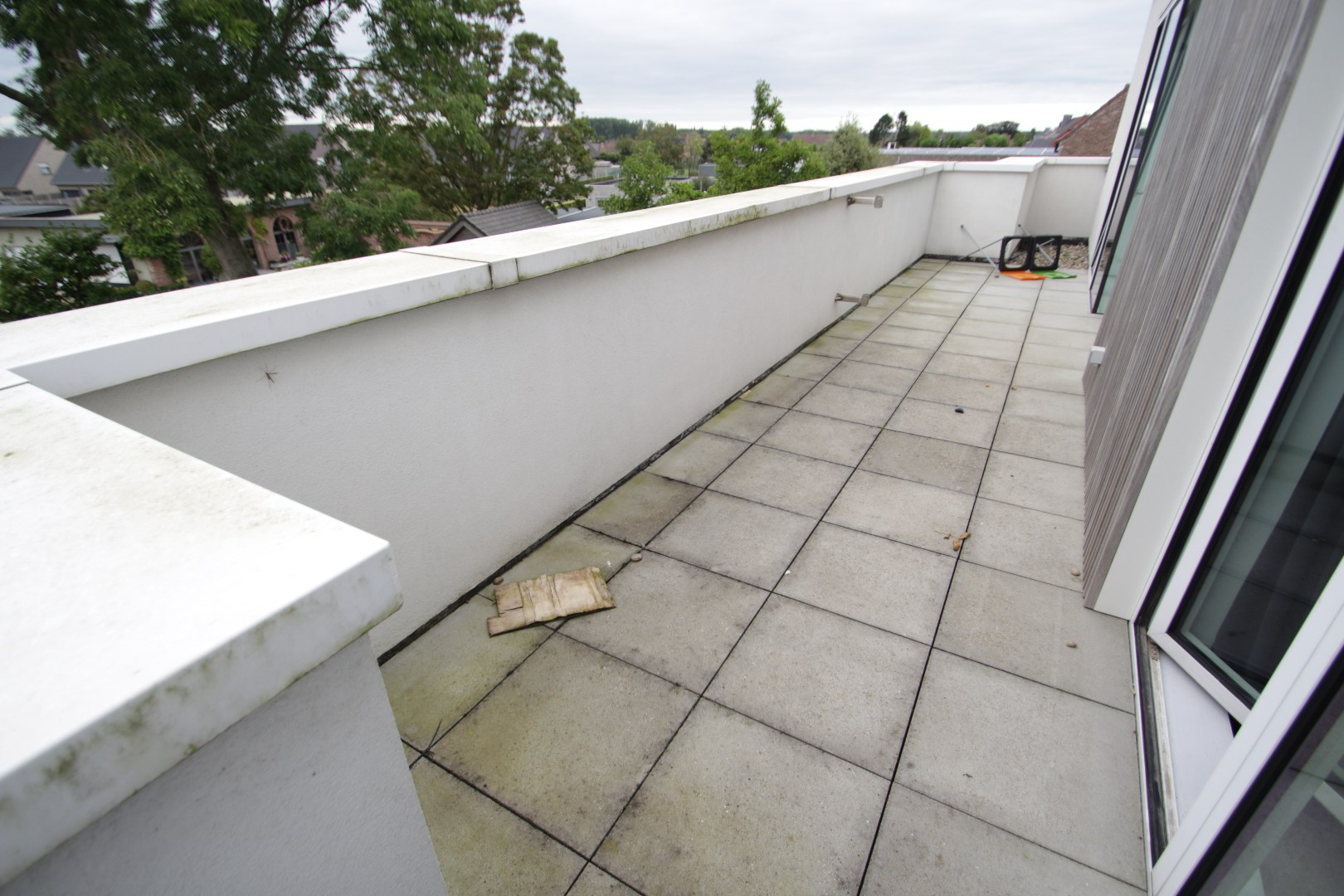 Centraal gelegen dakappartement met één slaapkamer en garage 