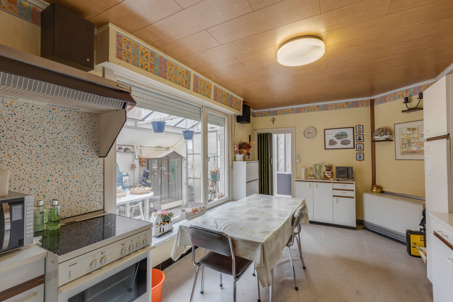 Buitenkans: rijwoning met tuin te Serskamp 