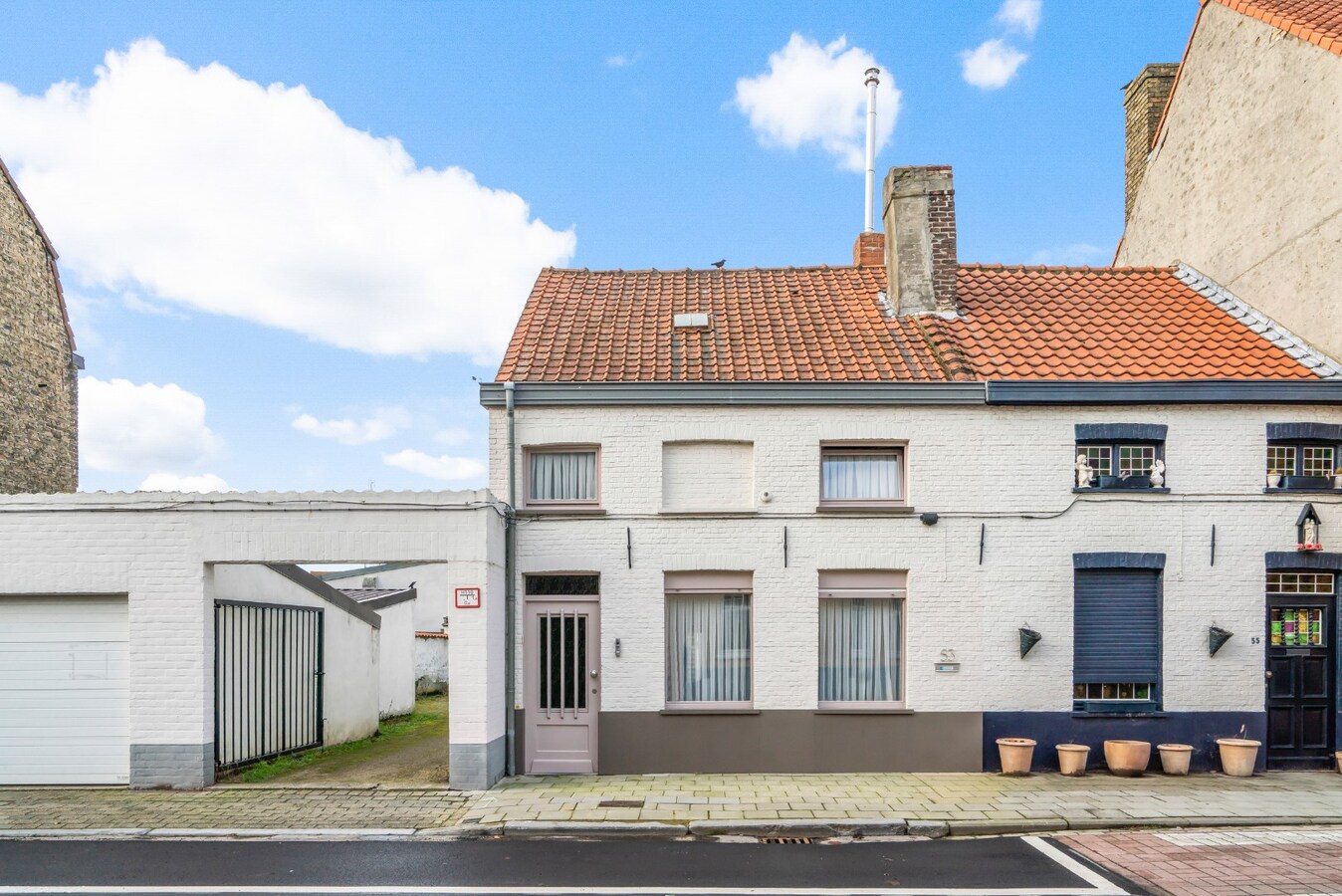 Halfopen bebouwing met terras in Christus - Koning (Stubbekwartier) 