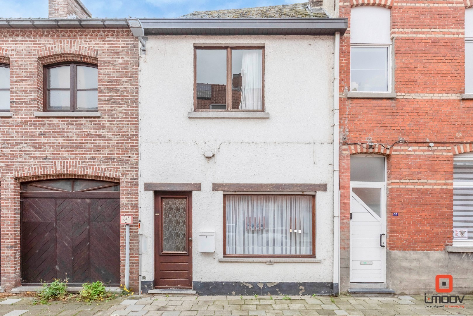 Charmante rijwoning te koop met koer en uitbreidingsmogelijkheden in Melle 