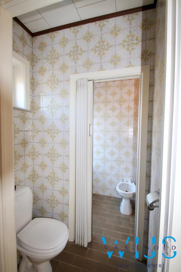 Charmante open bebouwing gelegen in gezellige wijk te Evergem! 