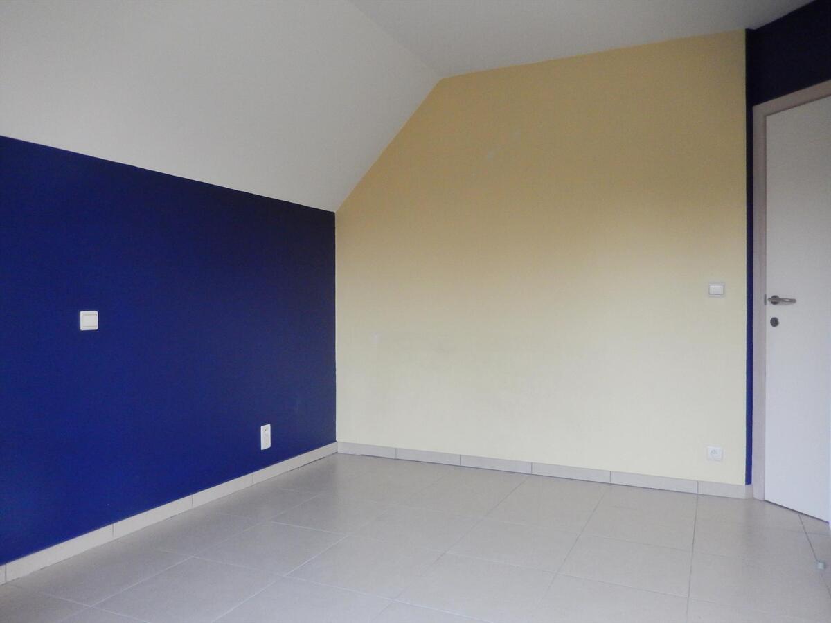 Gezellig en lichtrijk 2 slaapkamerappartement met garage 