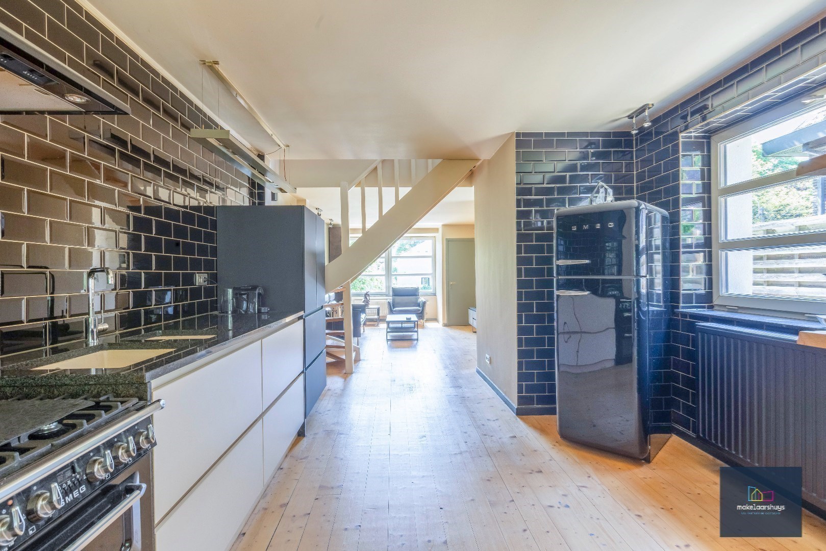 Halfopen bebouwing met zuidertuin en parkeergelegenheid nabij centrum Destelbergen 