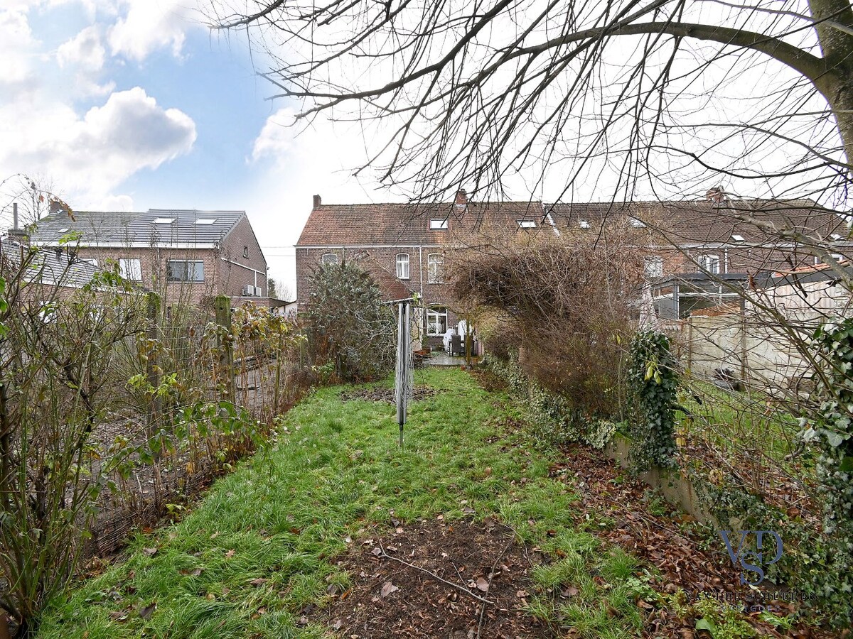 Gezellige rijwoning met tuin. 