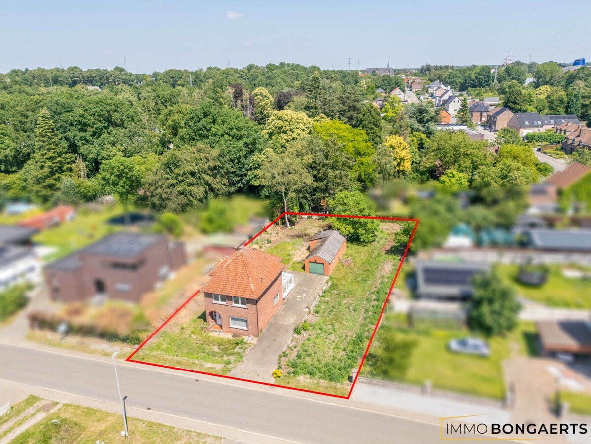 Te renoveren woning op perceel met tal van mogelijkheden 