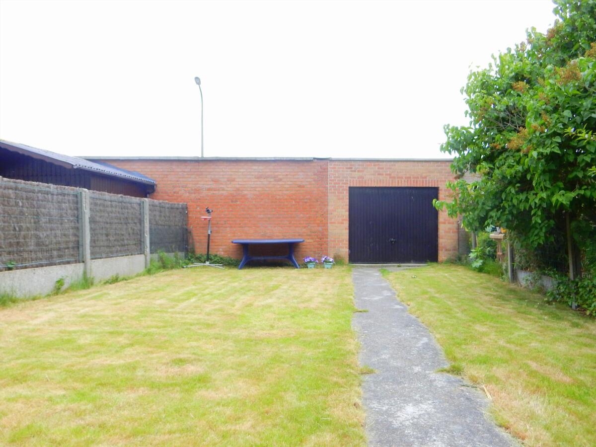 Appartement met garage en grote tuin 