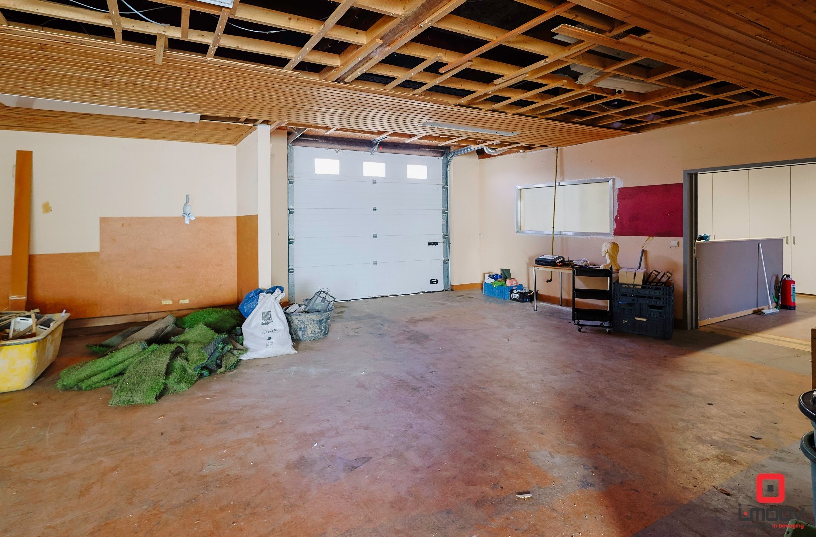 Bel-etagewoning met tuin, loods (450 m²) en tal van mogelijkheden 