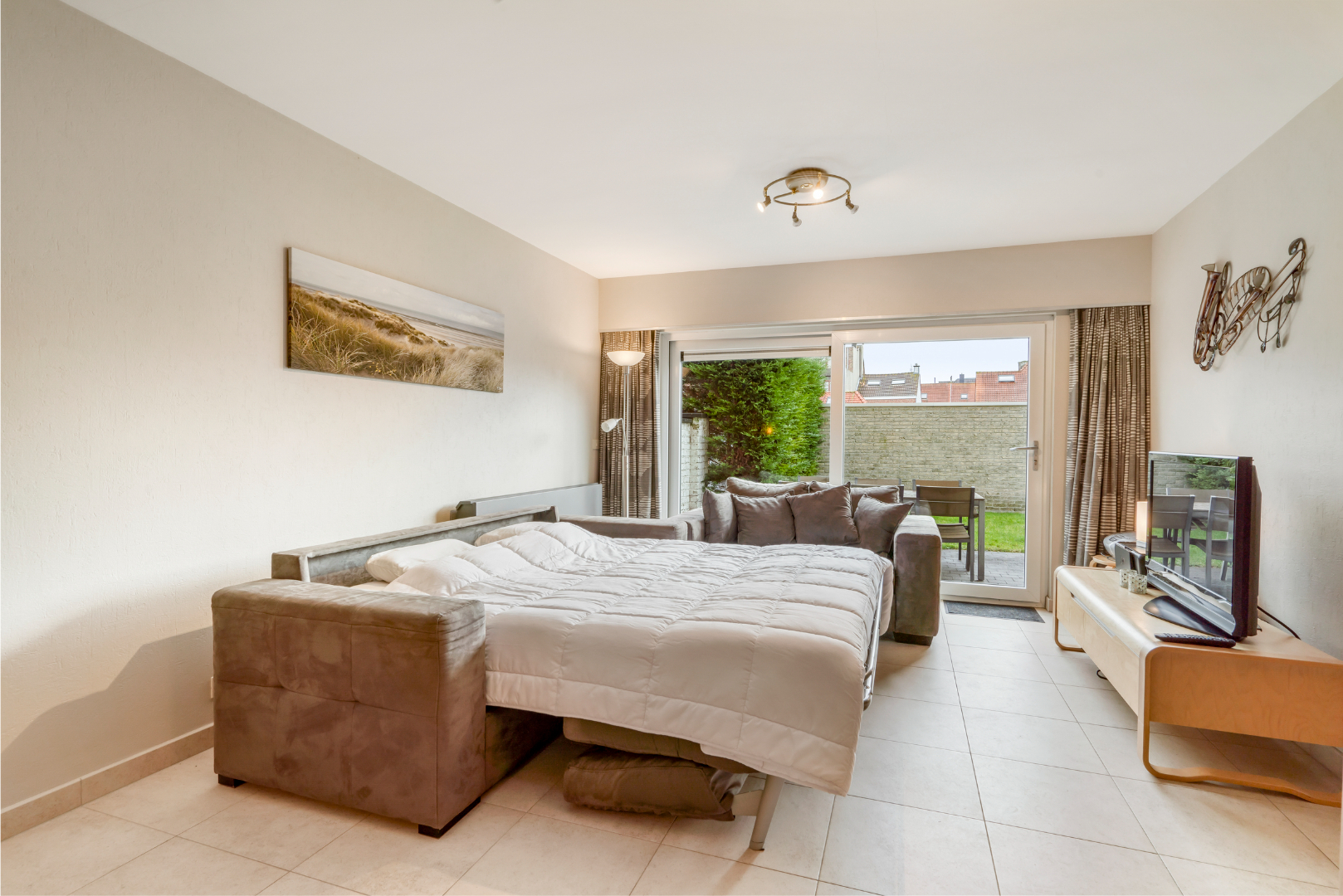 VAKANTIE APPARTEMENT MET ZONNIGE TUIN (VAKANTIEVERHUUR) 