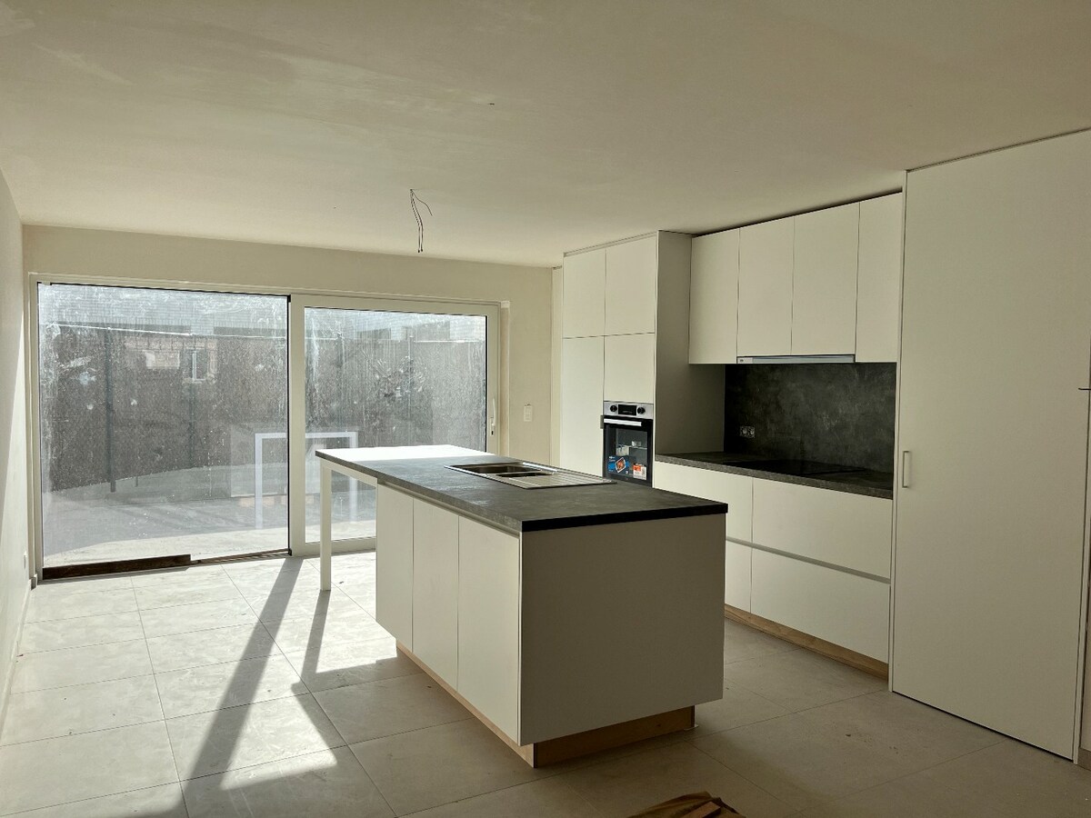 Instapklare nieuwbouwwoningen met garage en autostaanplaats te Langemark 