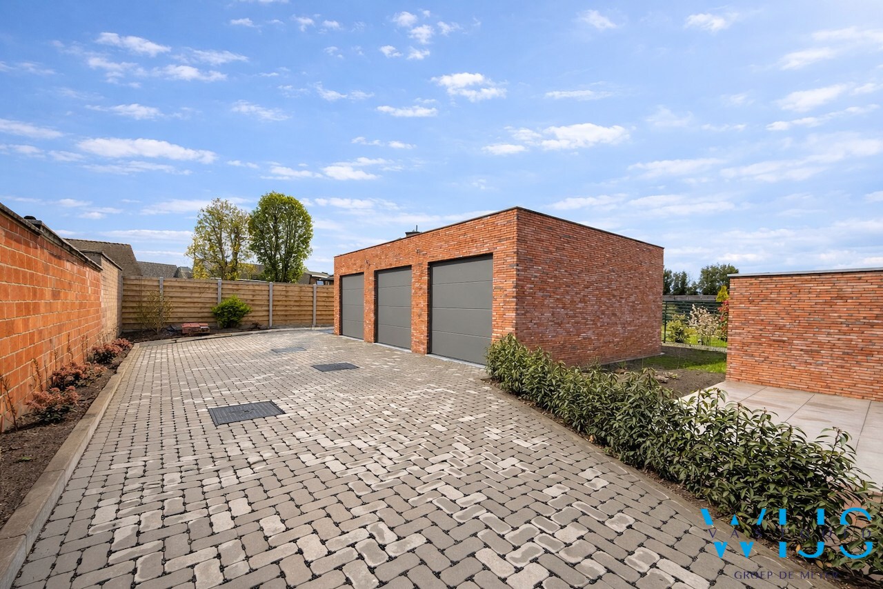 Drieslaapkamer appartement met garage in hartje Ertvelde ! 