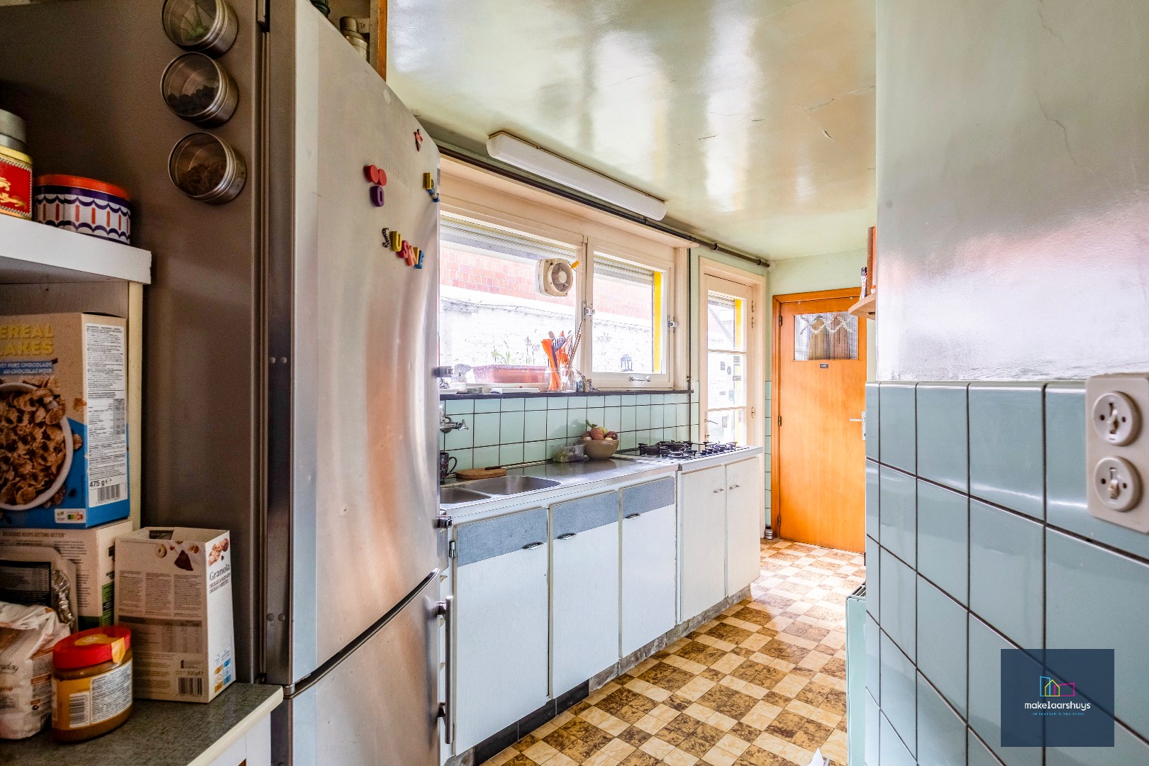 Woning met 3 slaapkamers en verrassende tuin met bijgebouwen 