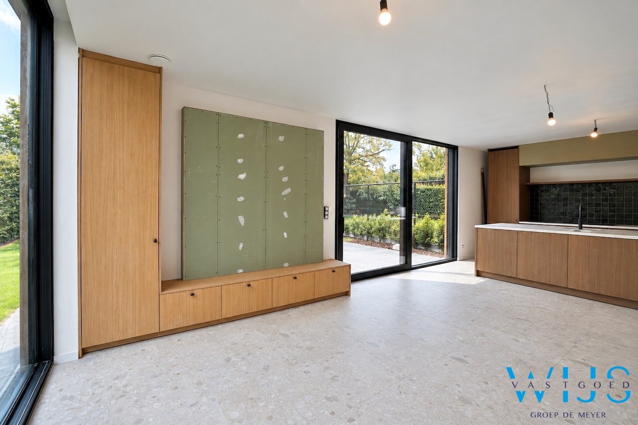 High-end gelijkvloers appartement met tuin te Lembeke ! 