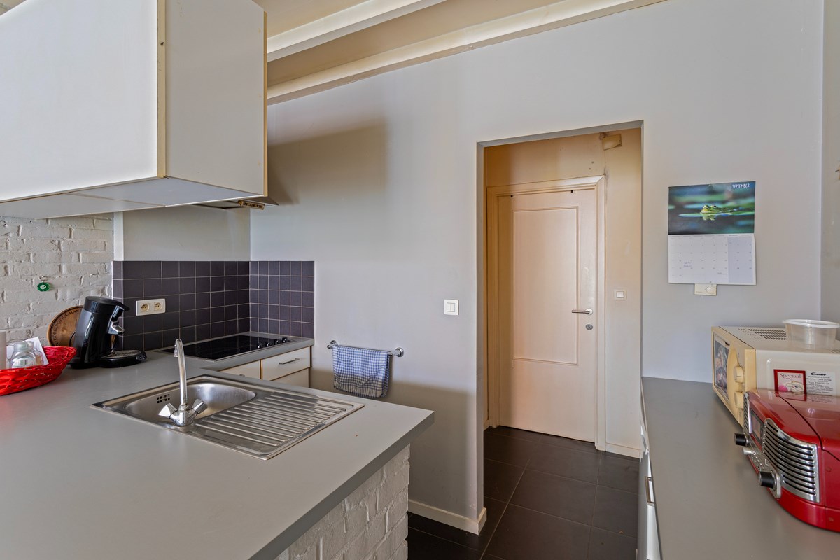 Gelijkvloers appartement met berging. 