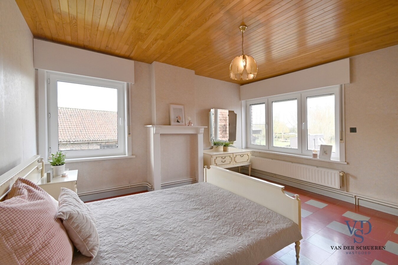 Half Open gezinswoning met potentieel 