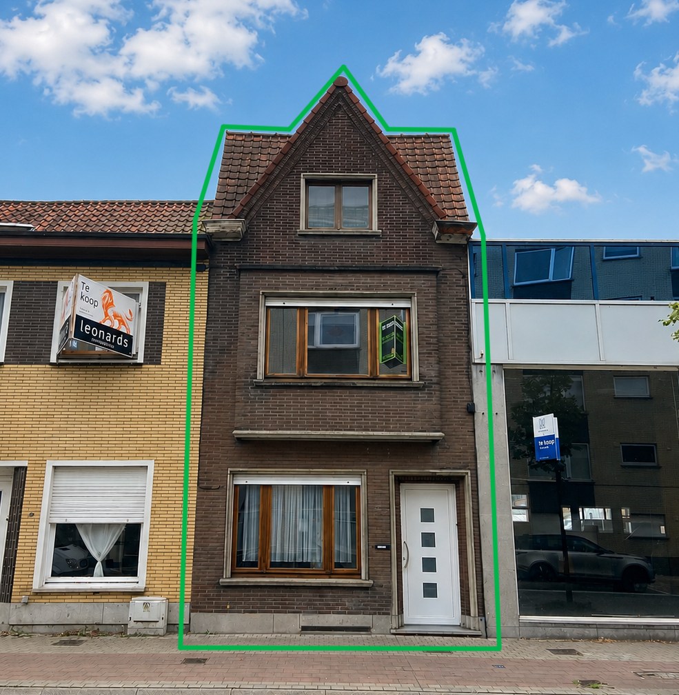 Authentieke burgerwoning met ruime garage en uitweg achteraan! 