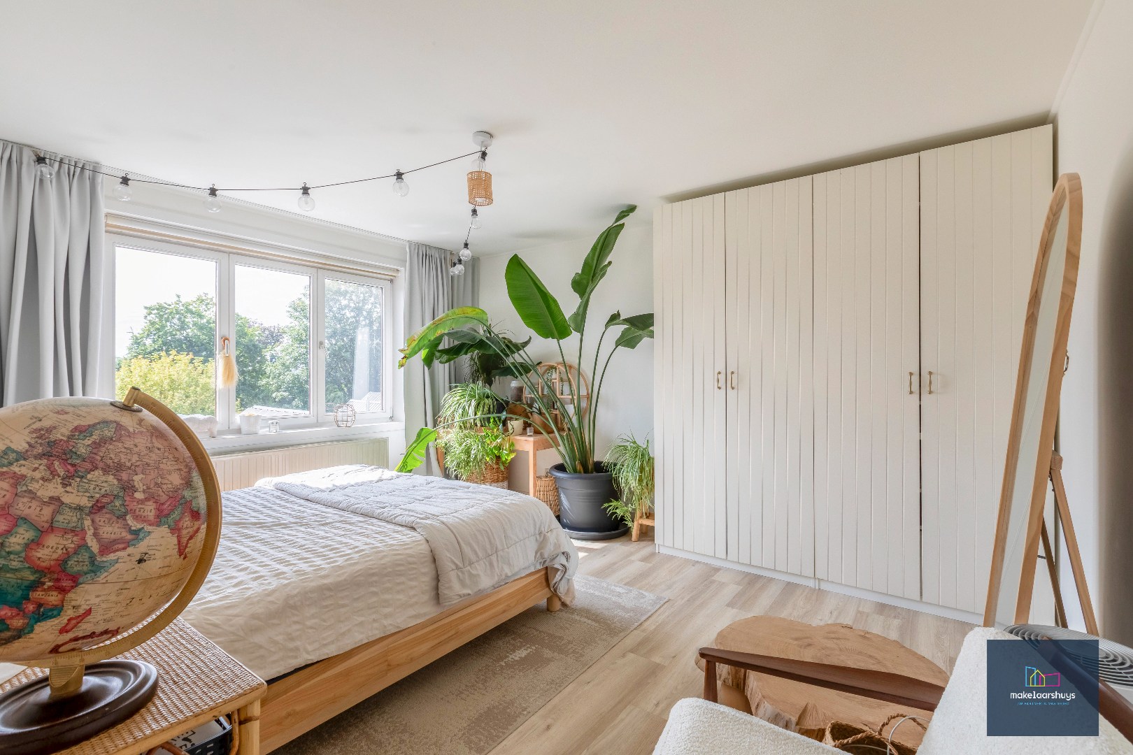 VERKOCHT ! Instapklare energiezuinige handelswoning met tuin en garage 