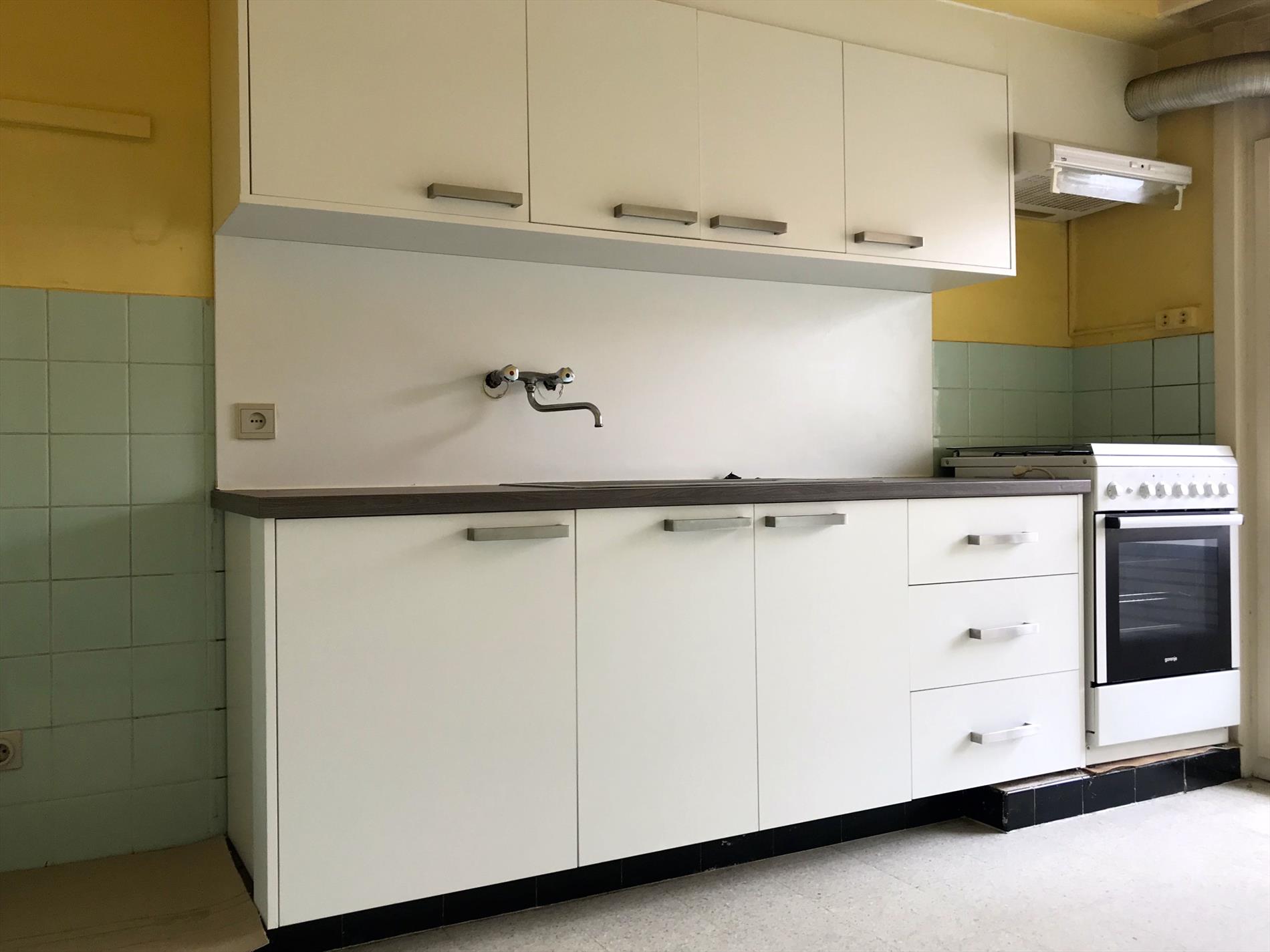 Op te frissen appartement op enkele minuten van markt 