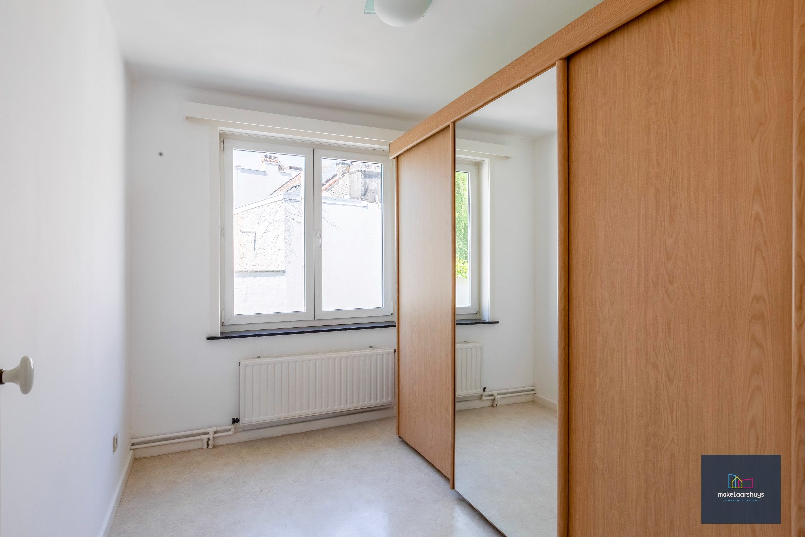 Centraal gelegen halfopen bebouwing met stadskoer 