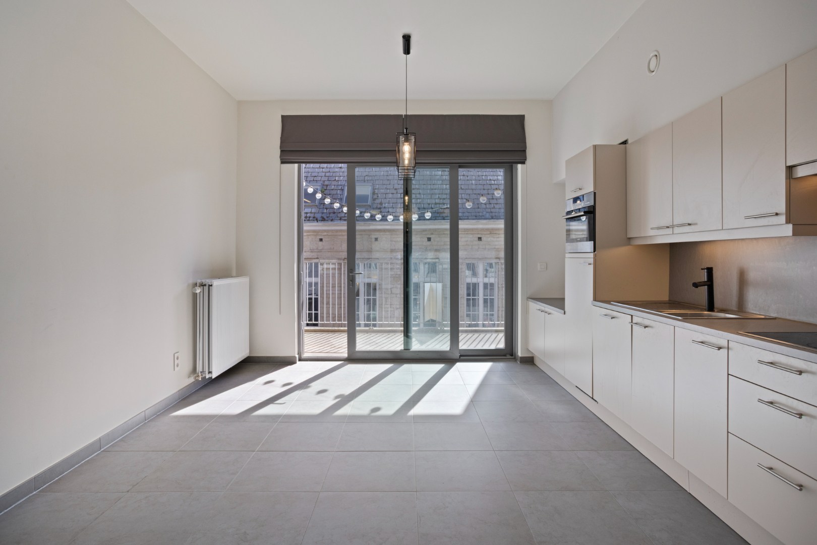 Studio met ruim terras, ondergrondse autostaanplaats en private kelderberging in Leuven! - EPC 60 kWh/m² - bewoonbare opp. 47 m² 