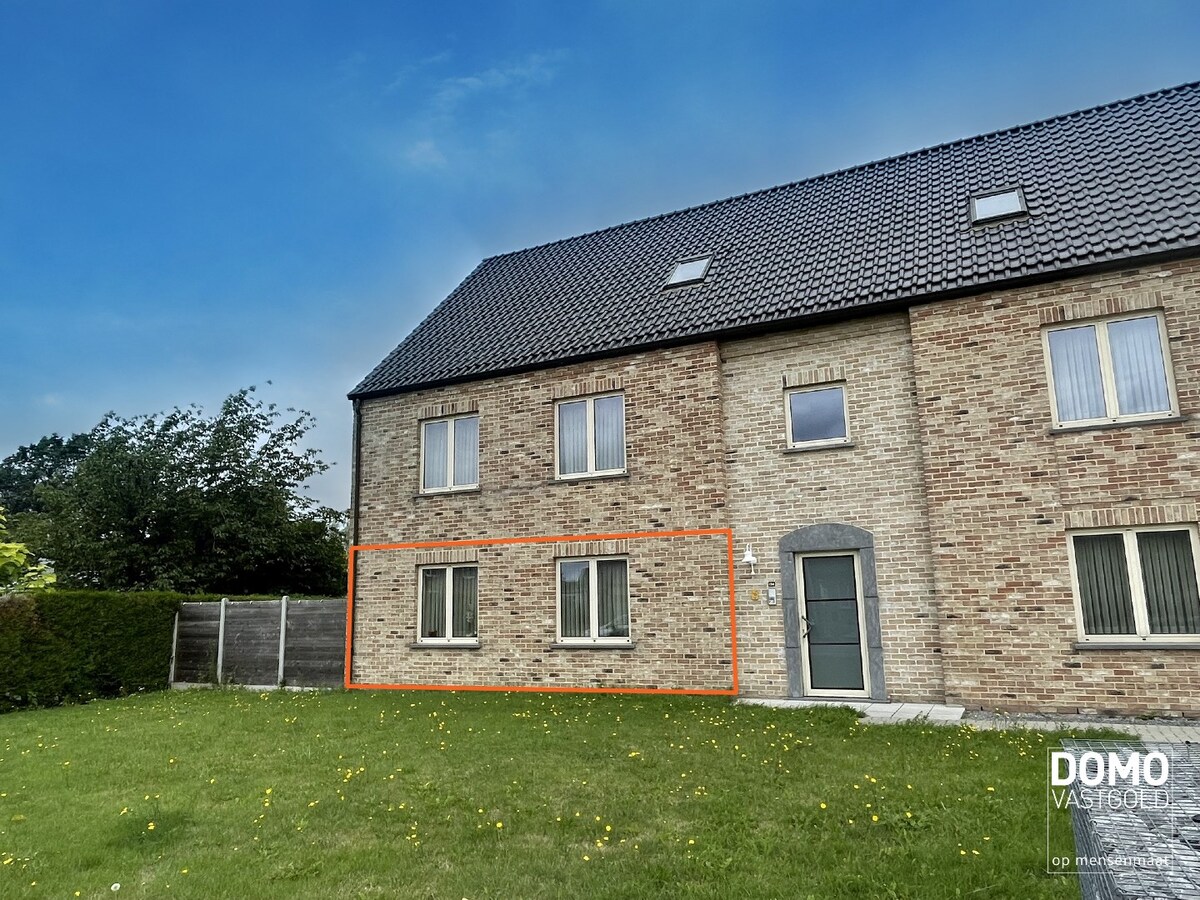 GELIJKVLOERS APPARTEMENT MET TUIN EN GARAGEBOX GELEGEN TE TUILT  (KURINGEN) 